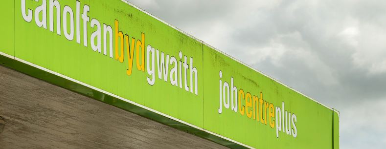 Arwydd Canolfan byd gwaith